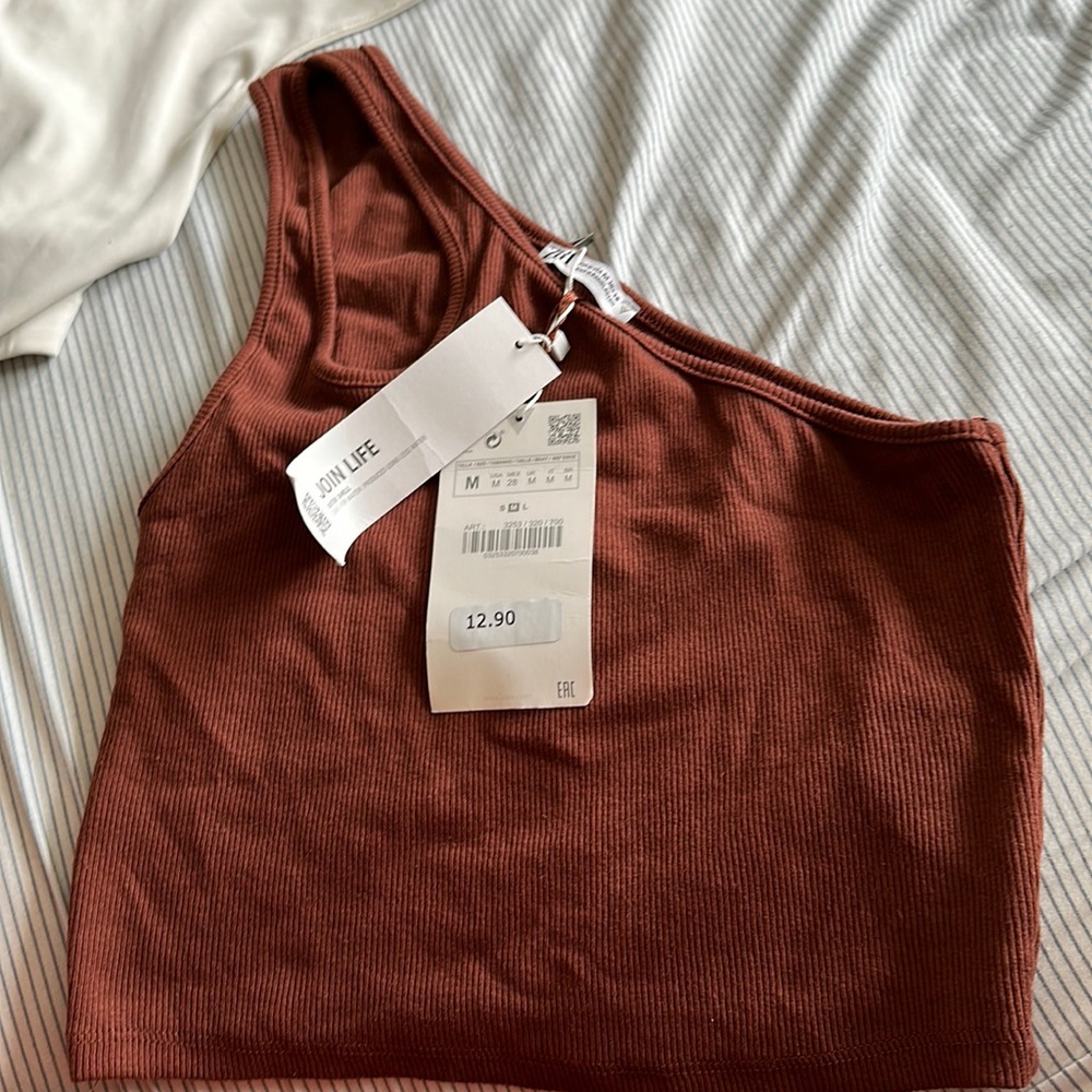Never been used , too late to return from ZARA size-medium . Like a crop top!